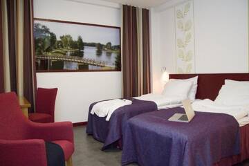 Фото номера Двухместный номер с 2 отдельными кроватями (без окна) Отель Hotel Salora г. Сало 5