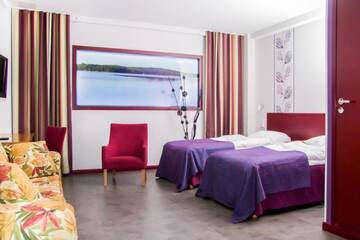 Фото номера Двухместный номер с 2 отдельными кроватями (без окна) Отель Hotel Salora г. Сало 2