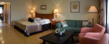 Фото номера Стандартный двухместный номер с 2 отдельными кроватями Отель Hotel Fjalar г. Сало 7